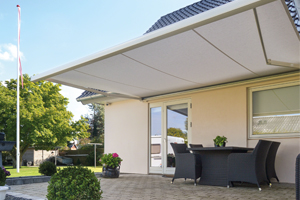 markilux retractable patio awning with valance offering sun shade protection to garden patio area